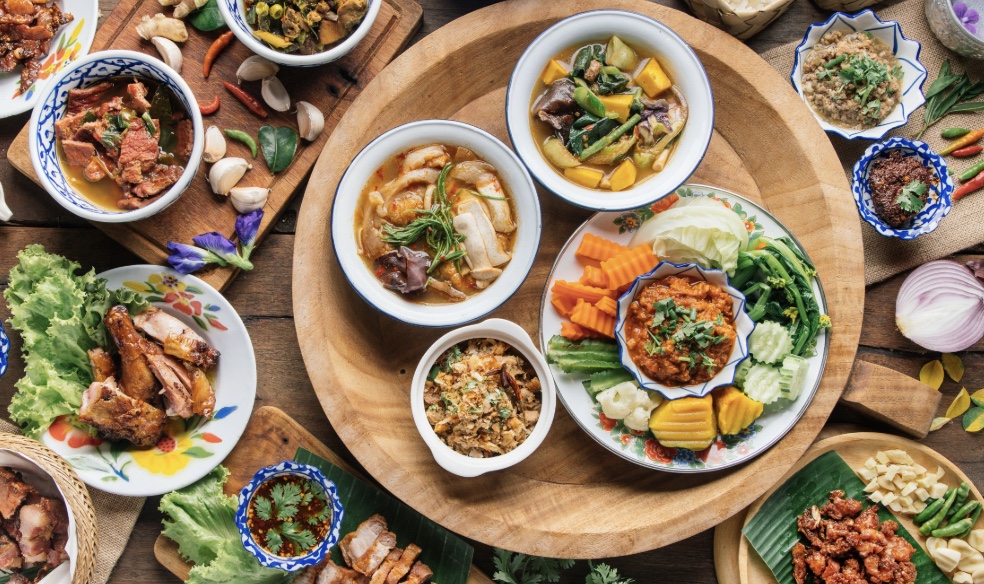 A colourful selection of Thai dishes served family style